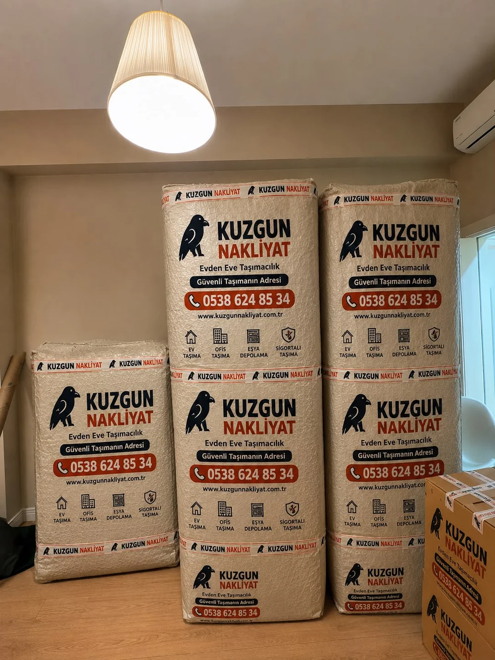 Kuzgun Nakliyat markalı ambalajlı eşyalar